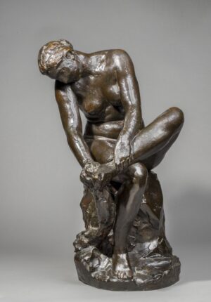 BATHER DRYING HER FOOT